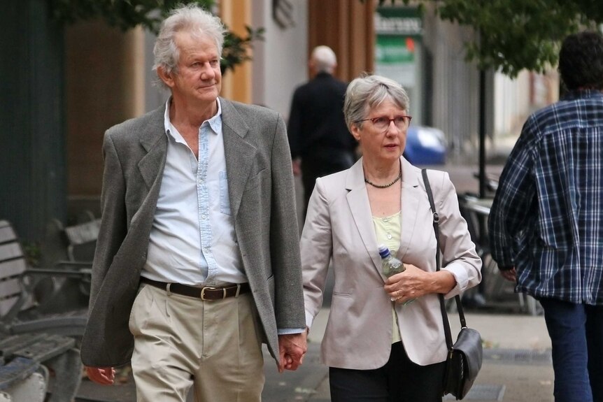 Barbara Eckersley walks to Goulburn Court House, Montague Street, holding hands with a man.
