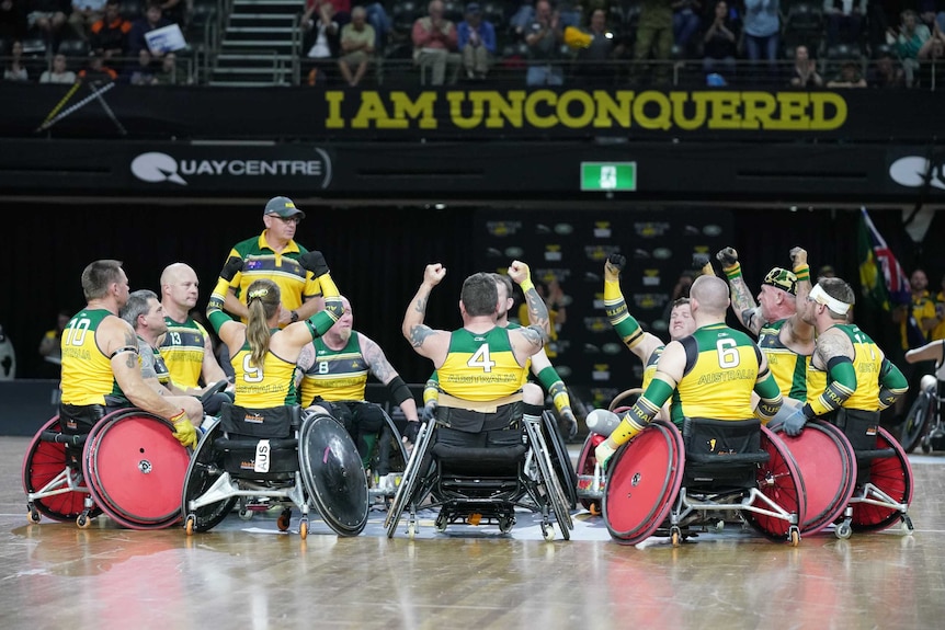 Australian wheelchair rugby team celebrates a win
