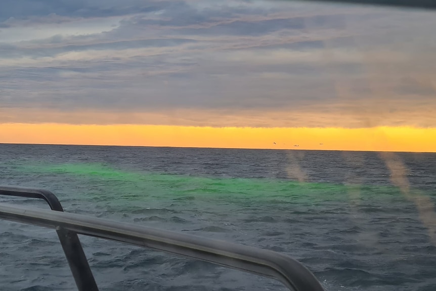 Green dye in the ocean for search of missing spear fisherman on the NSW south coast