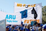 Supporters wearing Western Force shirts hold banners - one says No Force, No Future.