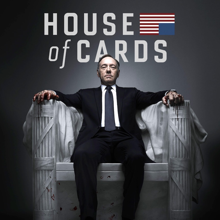 A publicity poster for House of Cards showing Kevin Spacey sitting in the Lincoln Memorial chair with bloodstained hands