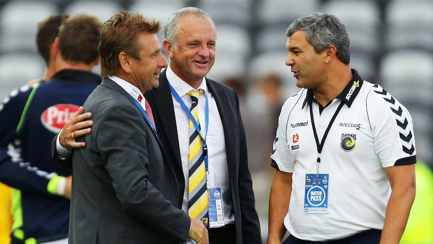 Graham Arnold and Phil Moss