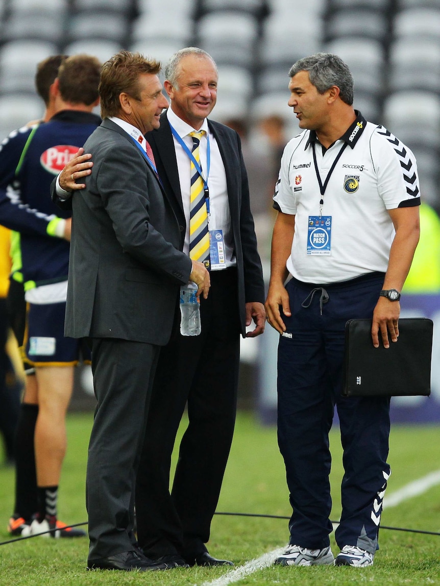 Graham Arnold and Phil Moss