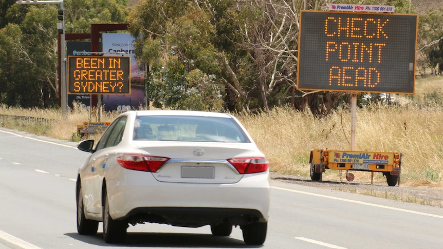 A car drives along the federal highway.