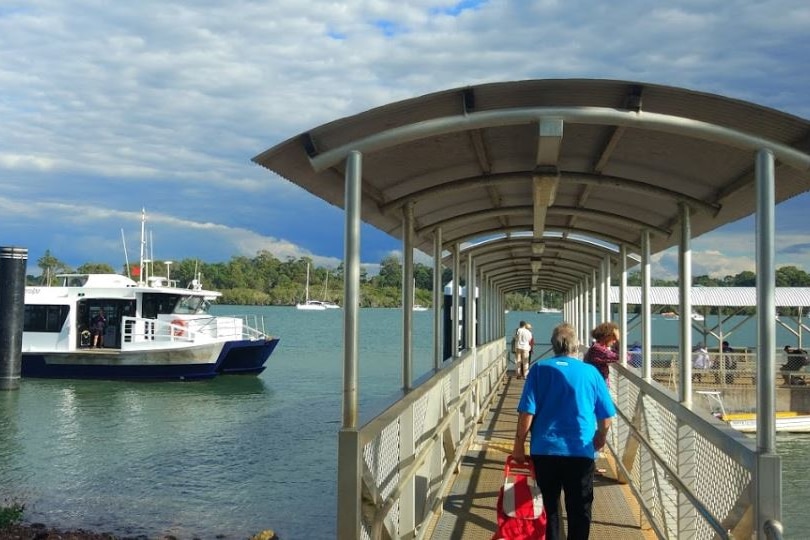 Passenger ferry arrives at ferry terminal at Macleay Island, off Brisbane.l