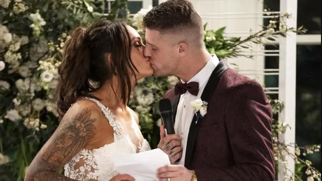 MAFS' Hayley and David kissing on their wedding day for a story about what a relationship counsellor thinks of the reality show.