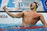 Kosuke Kitajima celebrates breaking the world record