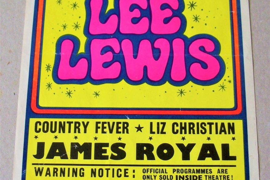 A bright yellow poster says Jerry Lee Lewis, Country Fever, Liz Christian and James Royal to promote a 1972 UK music tour.
