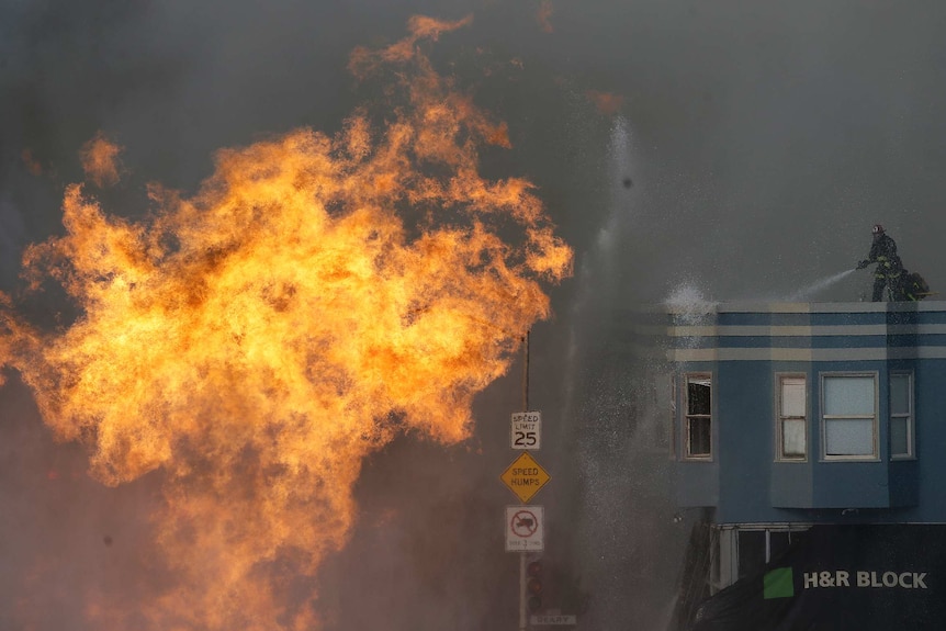 A fire burning in San Francisco because of a gas explosion.