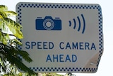 A sign warning of a speed camera ahead in  Brisbane in 2012.