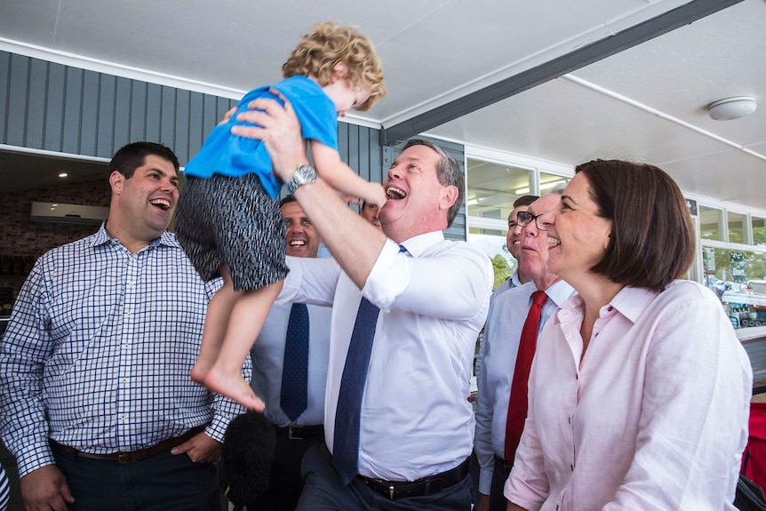 Tim Nicholls with Braith White, 2, flanked by LNP deputy leader Deb Frecklington