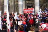Unionists and supporters at an equal pay rally on the steps of Parliament House