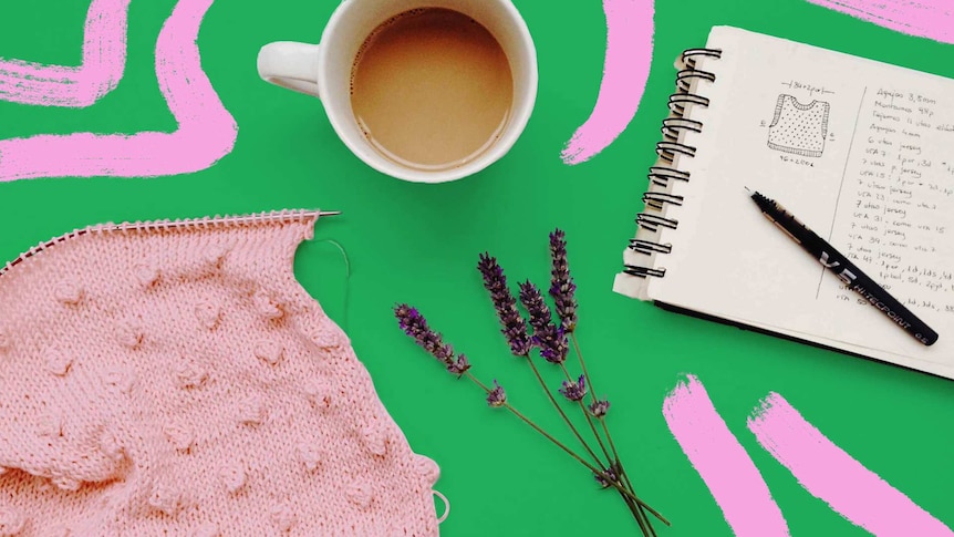 A cup of tea and a notebook and pen for story about finding joy in hobbies while coronavirus social distancing.