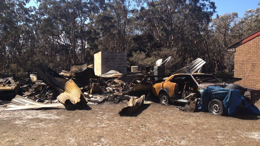 A garage destroyed during bushfires at Salt Ash on Sunday.