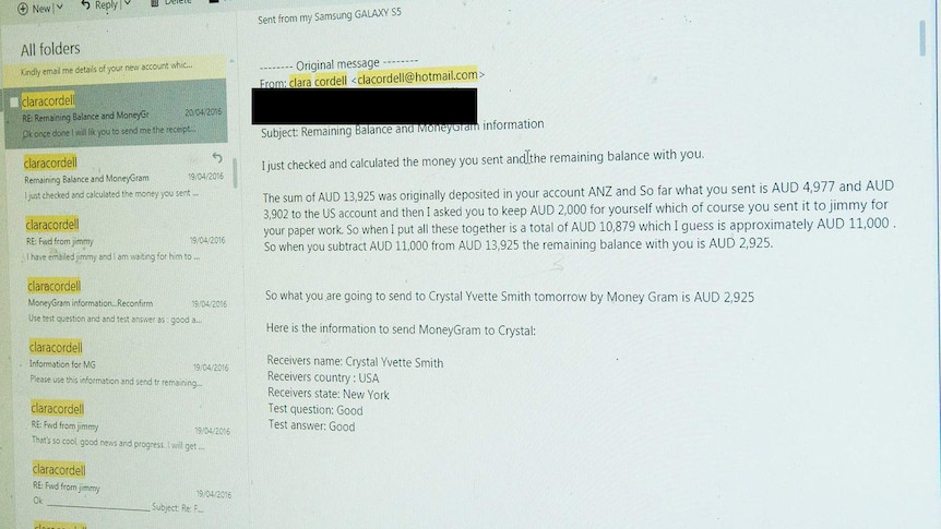 Emails in 2016 about money laundering scam displayed on a computer screen.