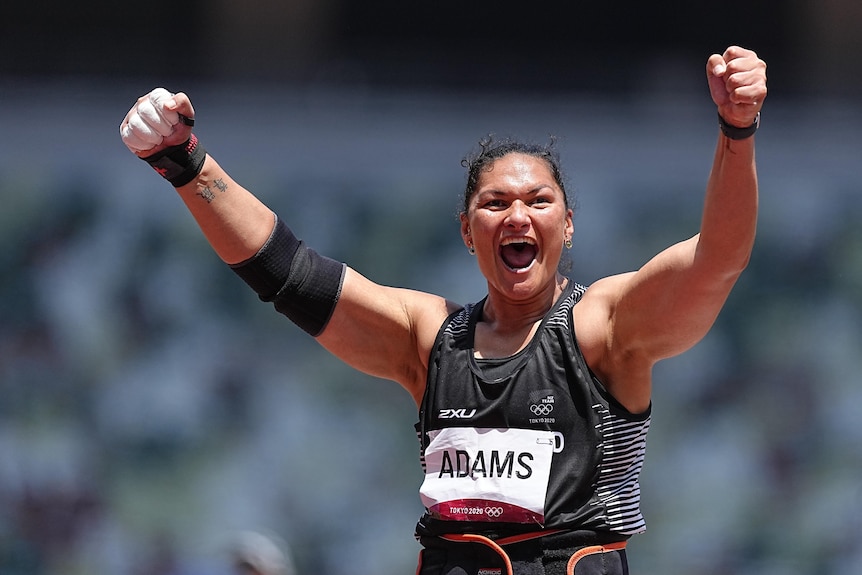 Valerie Adams raises her arms