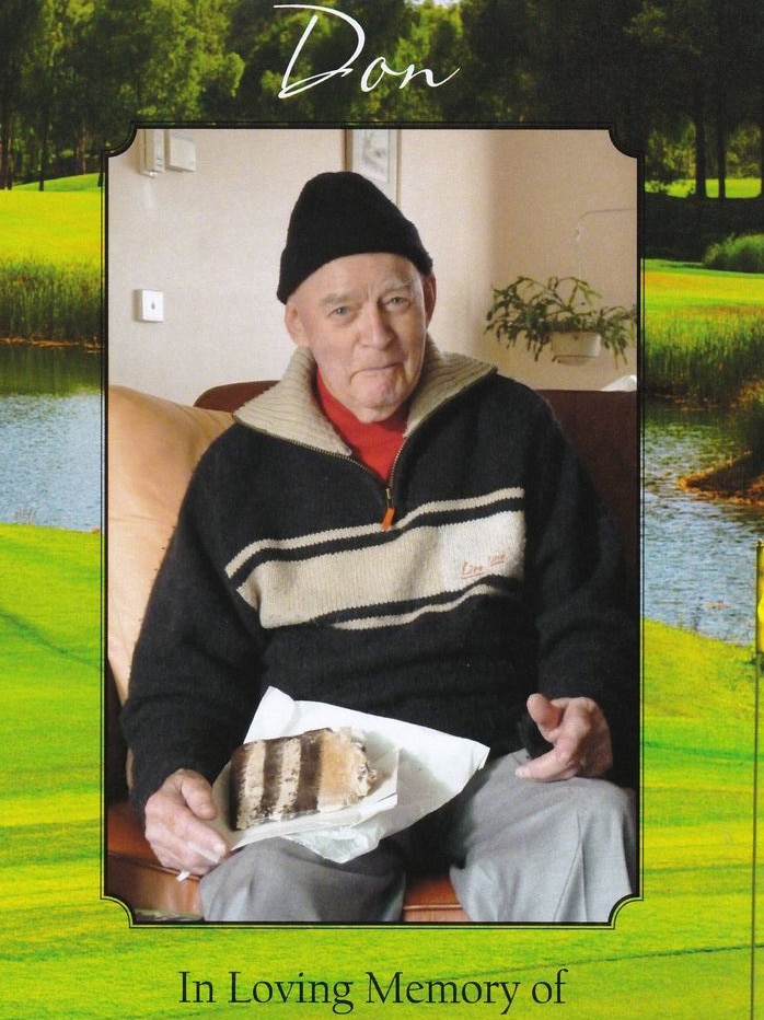 Photo of man in jumper with Golf course in background