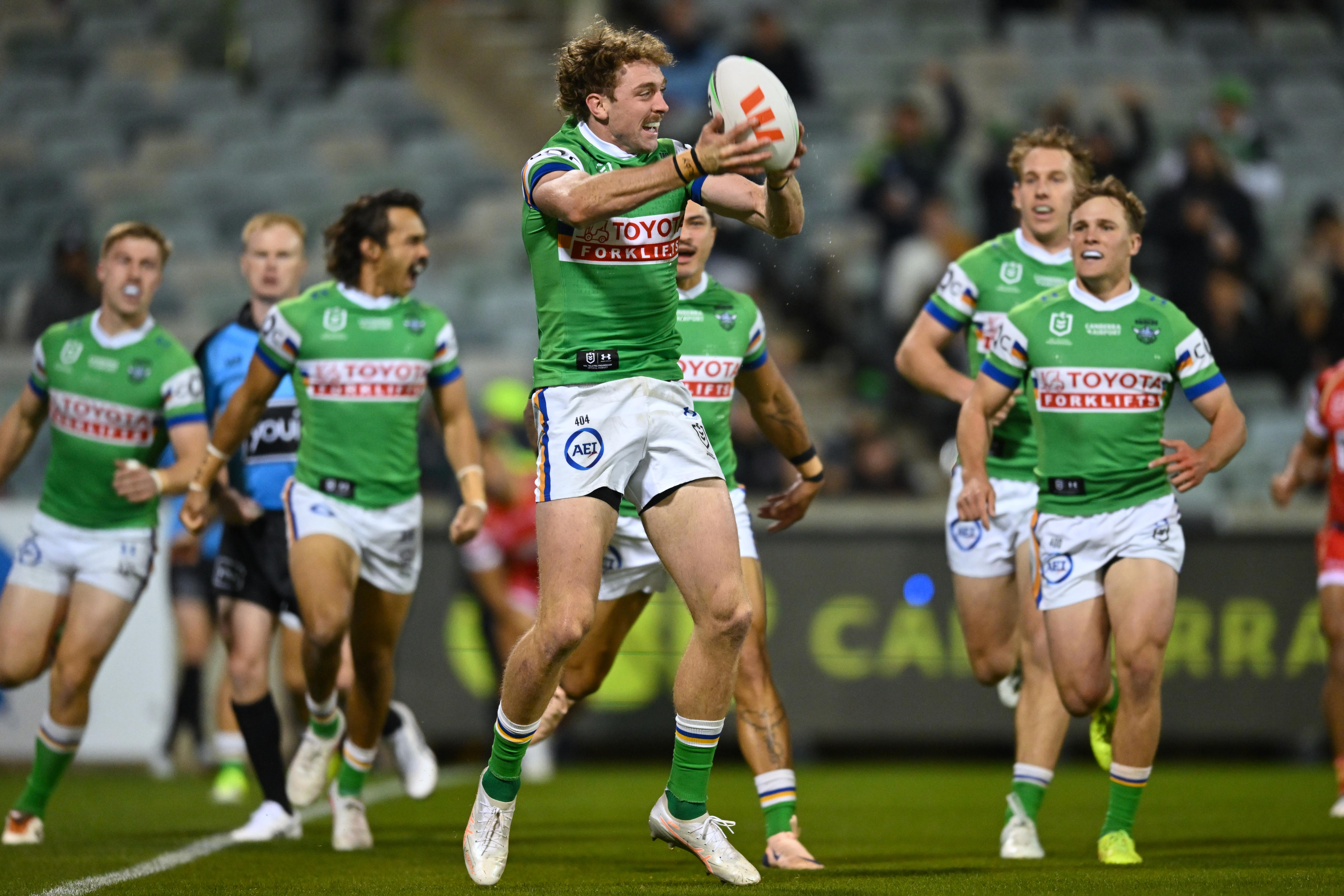 Jed Stuart throws the ball in the air