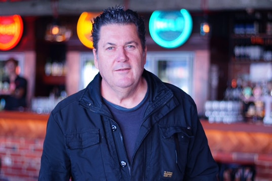 Michael Keiller stands in front of a bar at Northbridge Brewing Company.