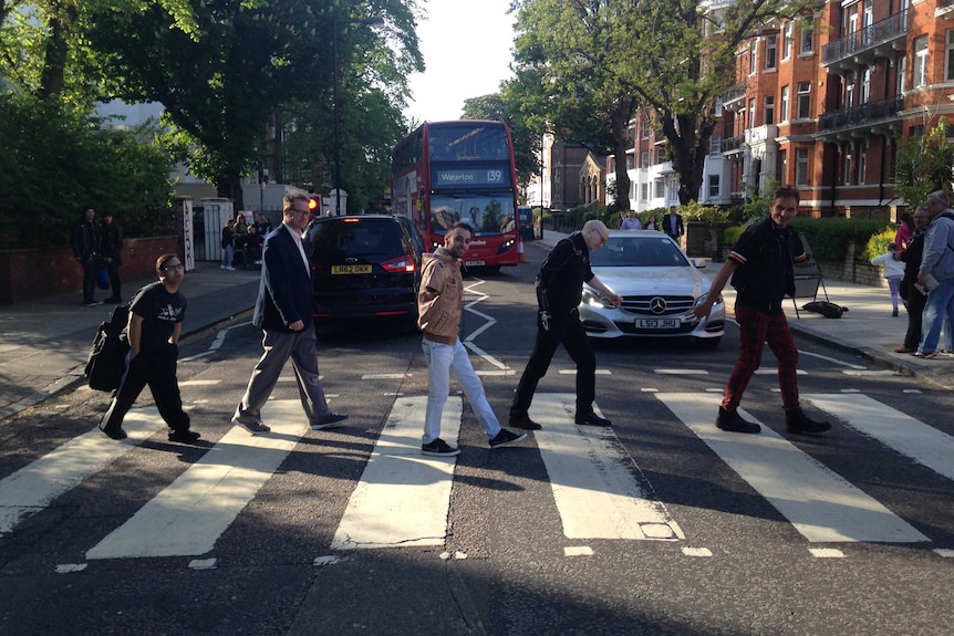 Neill Duncan and friends recreating the Abbey Road album cover