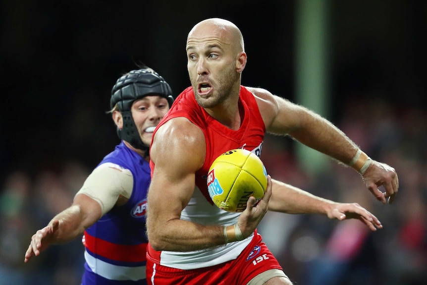 Sydney's Jarrad McVeigh makes a break during the round 15 AFL game against Western Bulldogs.