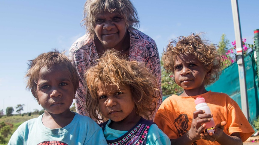 Aboriginal woman and three little kids