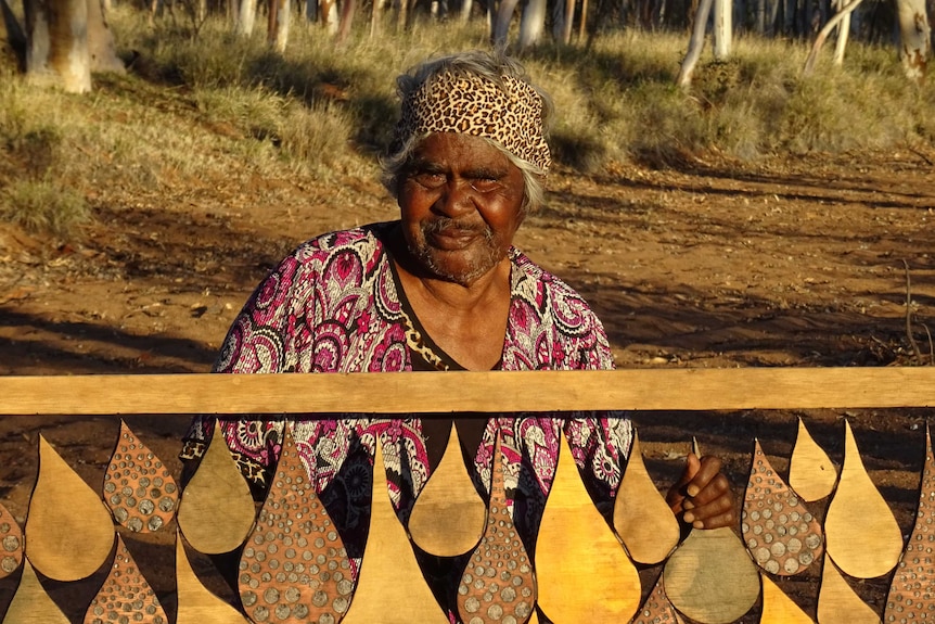 One of the artists with her work