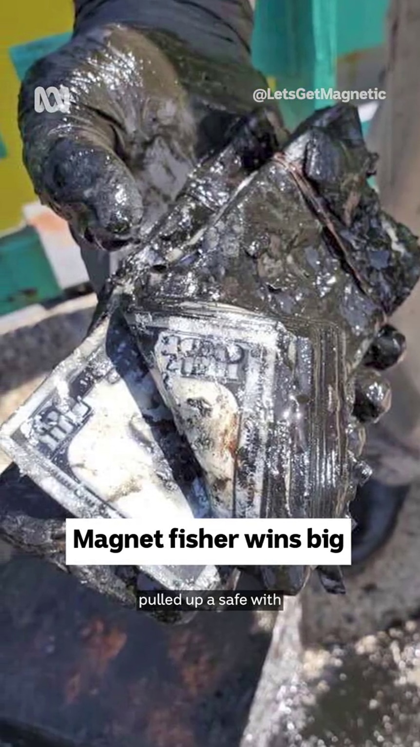 text box reads, "Magnet fisher wins big" and image shows a  wad of US $100 bills covered in sludge