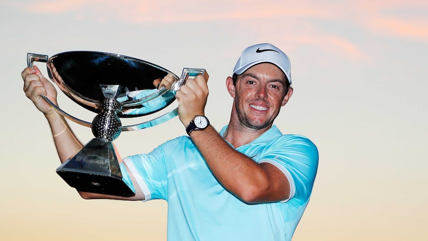 Nth Ireland's Rory McIlroy poses with the FedExCup after his Tour Championship win.