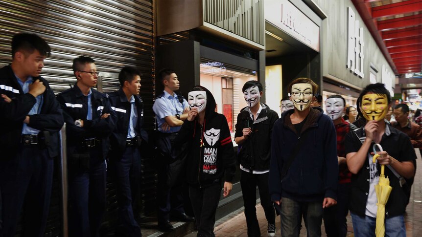 Hong Kong protesters in Guy Fawkes masks