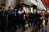 Hong Kong protesters in Guy Fawkes masks