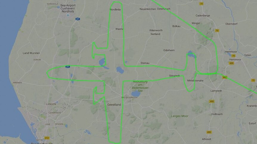 A private plane flying over Germany flies in the shape of a plane.