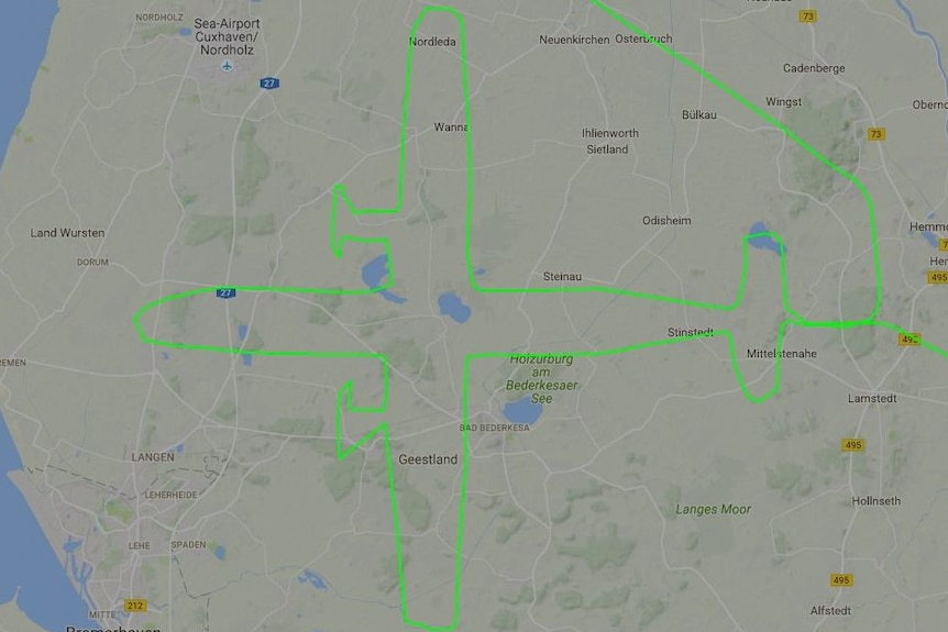 A private plane flying over Germany flies in the shape of a plane.