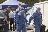 Forensic investigators at house at Kedron in Brisbane where a six-year-old girl was found dead