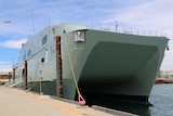 A vessel built by Austal for Oman sits at dock in Henderson, south of Perth.