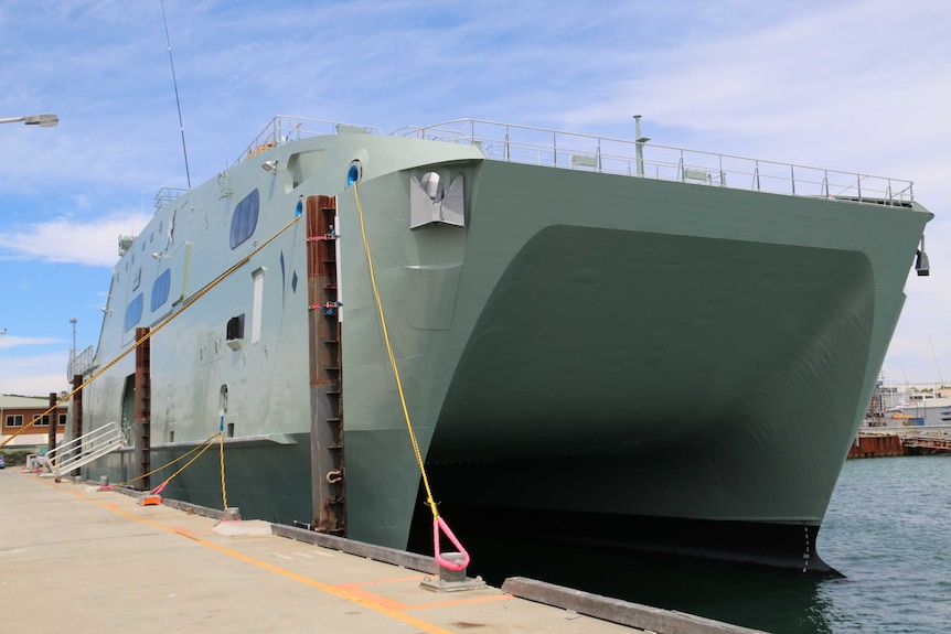 A vessel built by Austal for Oman sits at dock in Henderson, south of Perth.