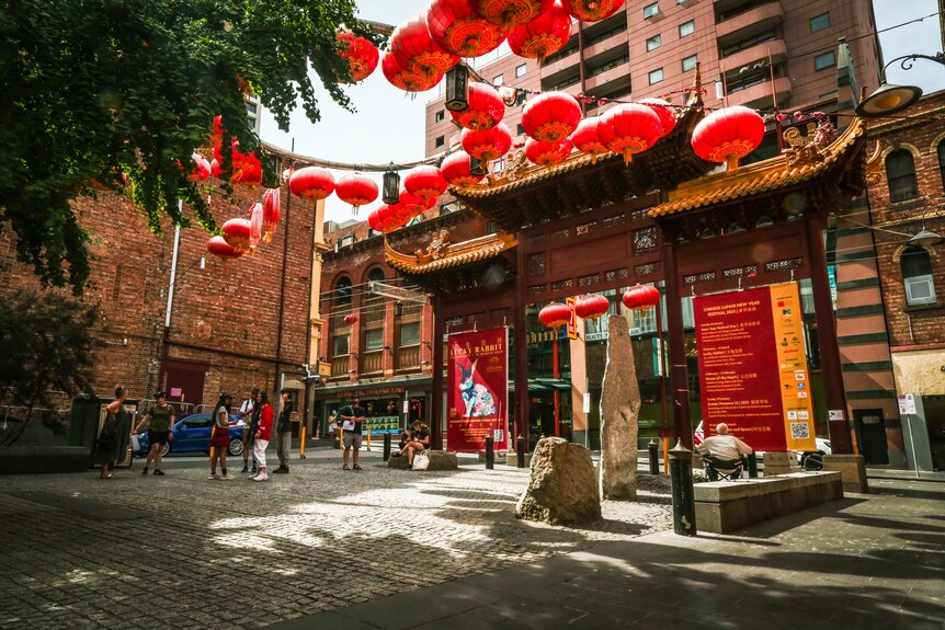 A photo of the iconic archway in Melbourne's Chinatown surrounded by red paper lanterns.