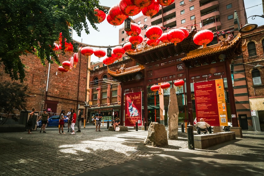 A photo of the iconic archway in Melbourne's Chinatown surrounded by red paper lanterns.