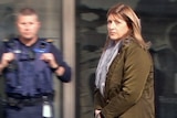 Margaret Jarvie, a former Jetstar manager, leaves an IBAC hearing in Melbourne.
