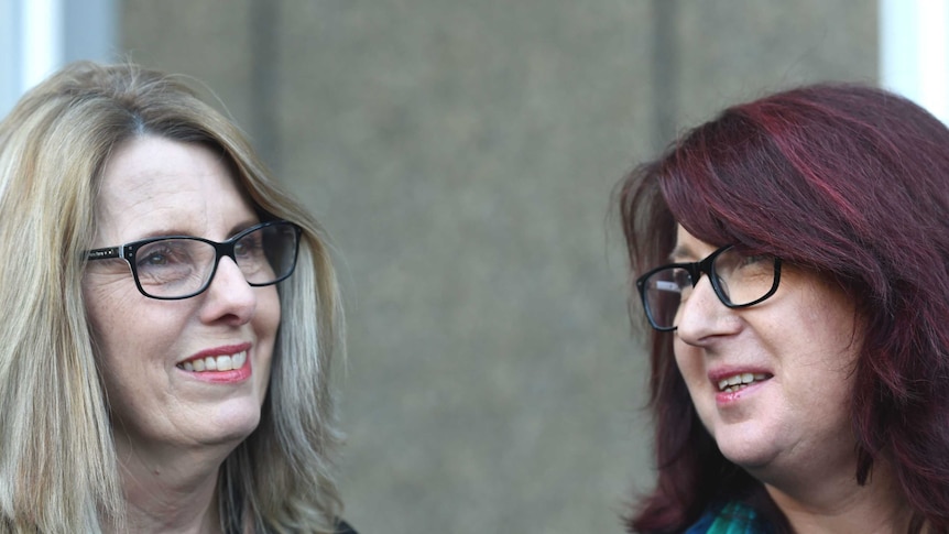 Glen Turner's partner Alison McKenzie (left), and sister Fran Pearce, speak outside court