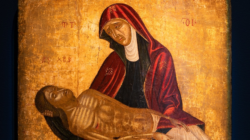 Medieval Christian icon depicting Mary crying while holding Jesus after he has died.