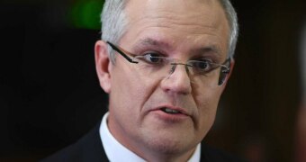 Scott Morrison looks at the camera while talking.