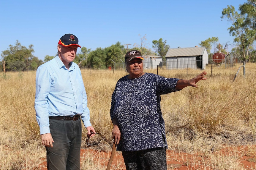 Phillip Heath and Rosalie Kunoth-Monks survey Utopia School lands.