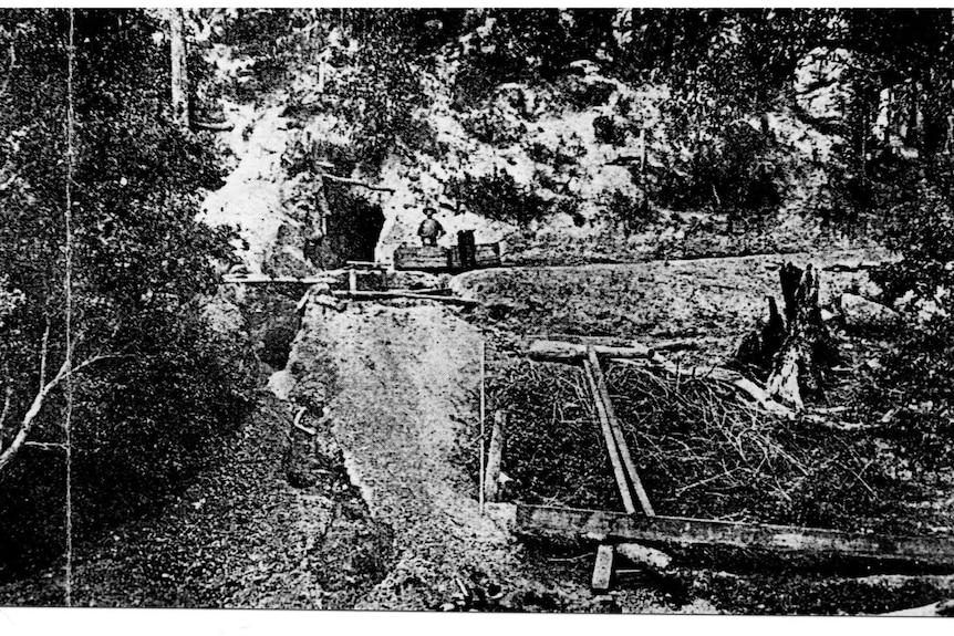 Black and white photo of cliffs of coal mine