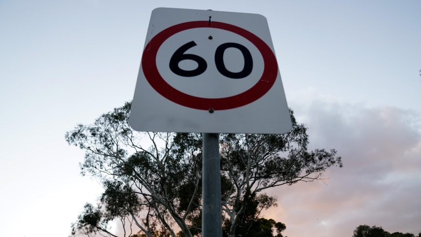 A road sign indicating a 60-kph speed limit.