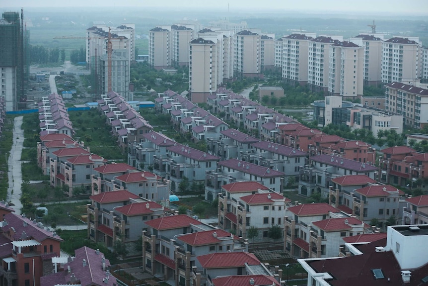 Sprawling houses and apartment buildings in China.