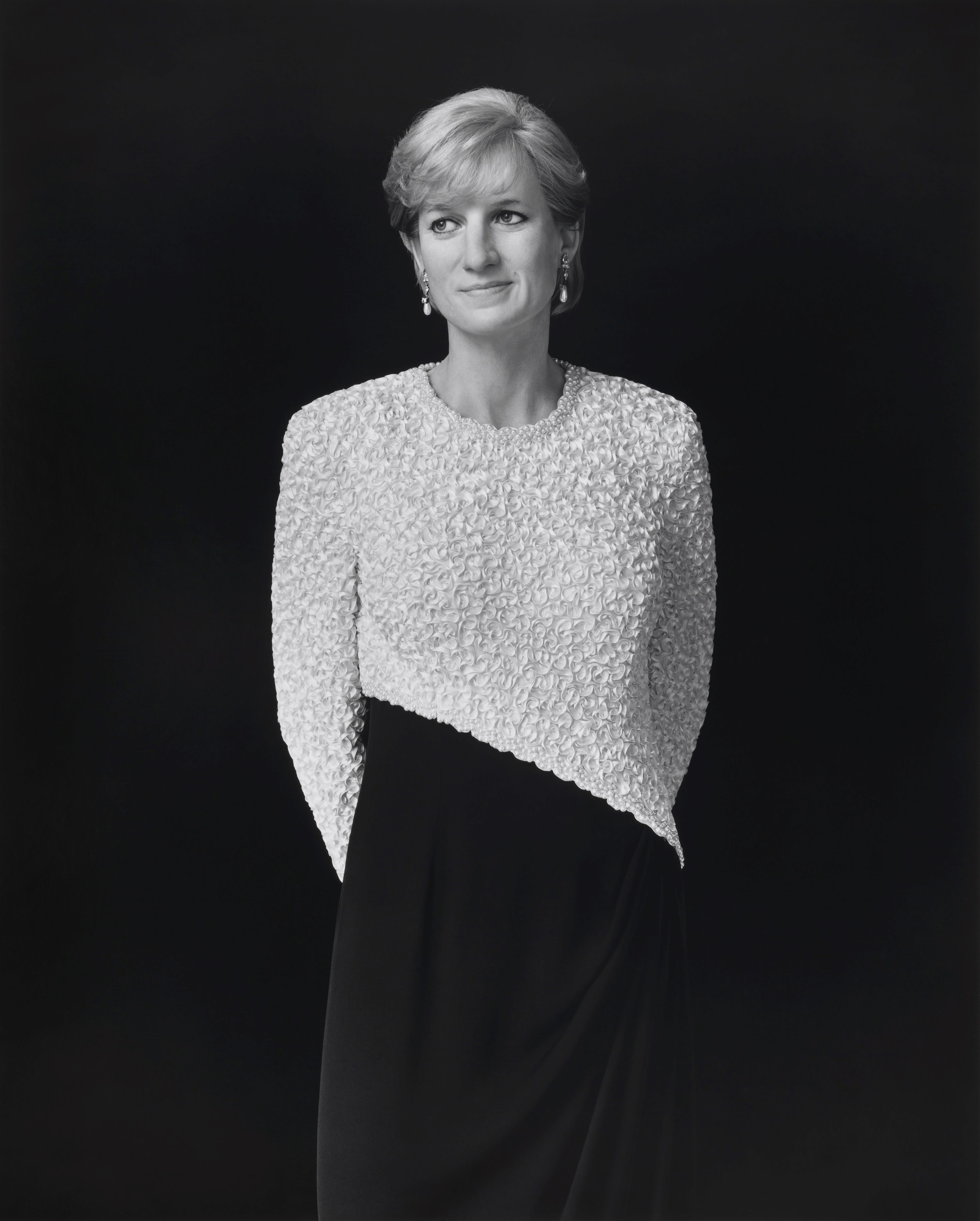 A black and white photograph of Princess Diana 