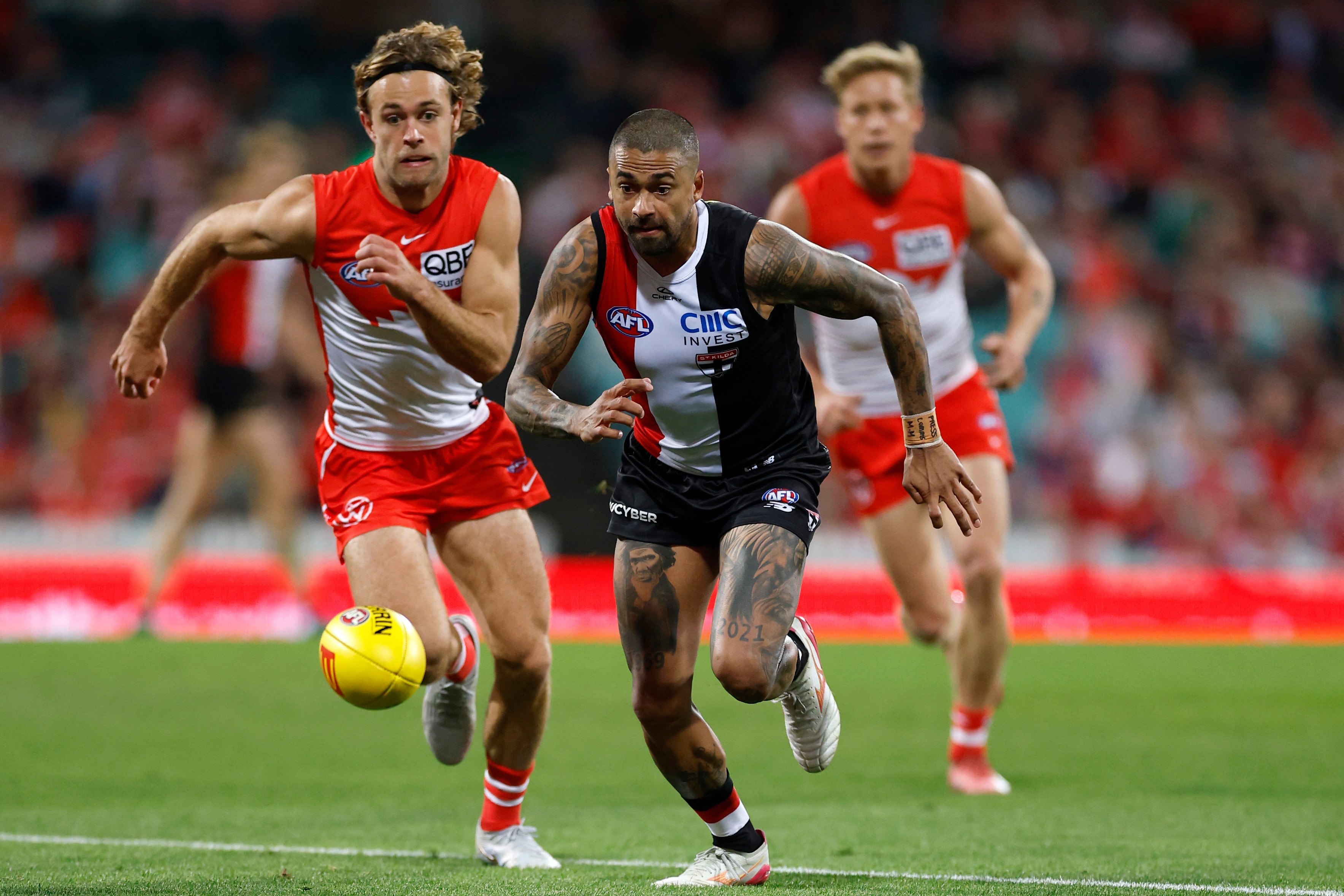 AFL Showdown: Swans and Hawks Battle for Top Four as Wildcards Eye Upset