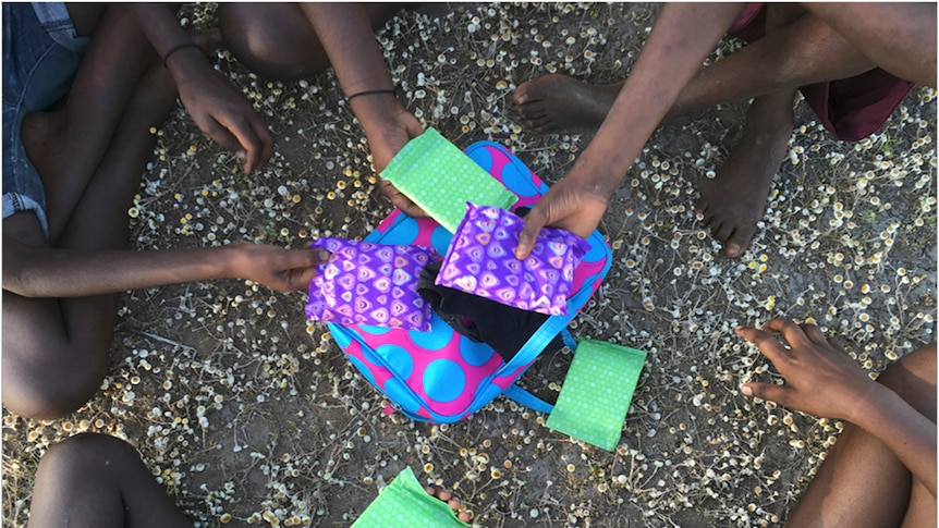 brightly coloured pads with unidentified young aboriginal women.