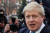 London mayor Boris Johnson delivers a statement to the media.